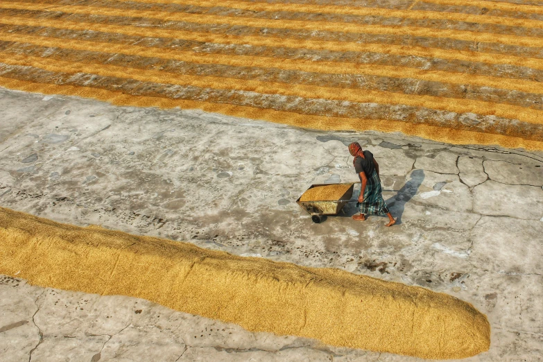 a man walks down a long road