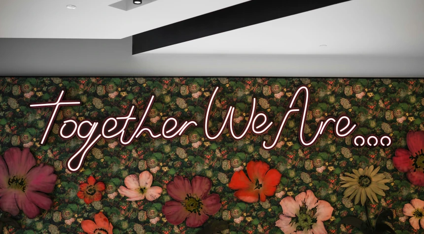 the neon sign says together we are surrounded by an image of flowers
