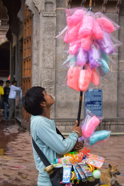 a man with an umbrella on a street