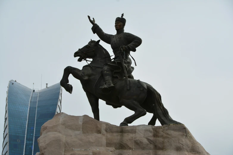 a statue of a man riding a horse