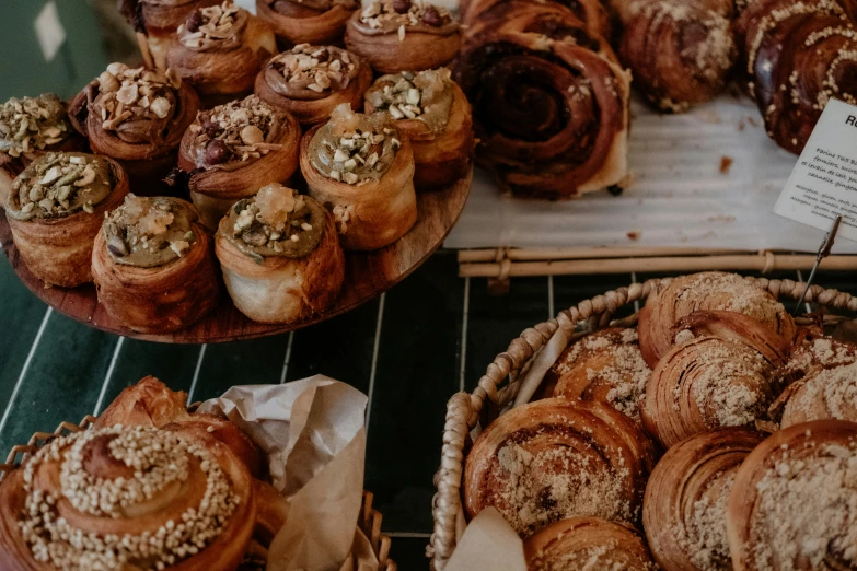 some tasty looking pastries are being served in a bakery