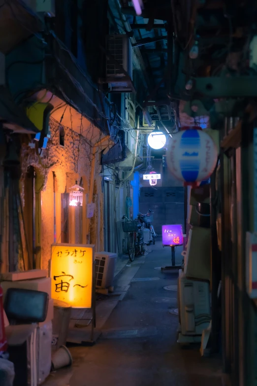 a street lined with lots of lit signs