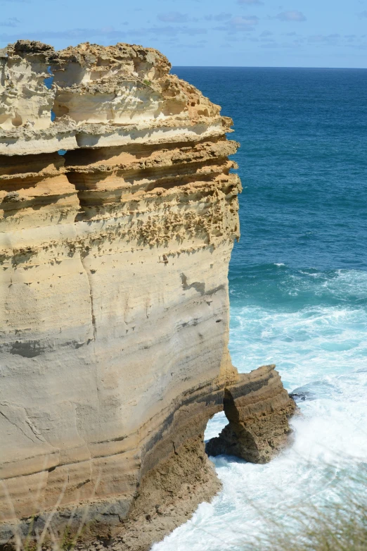 the view from the cliff over the ocean and rocks