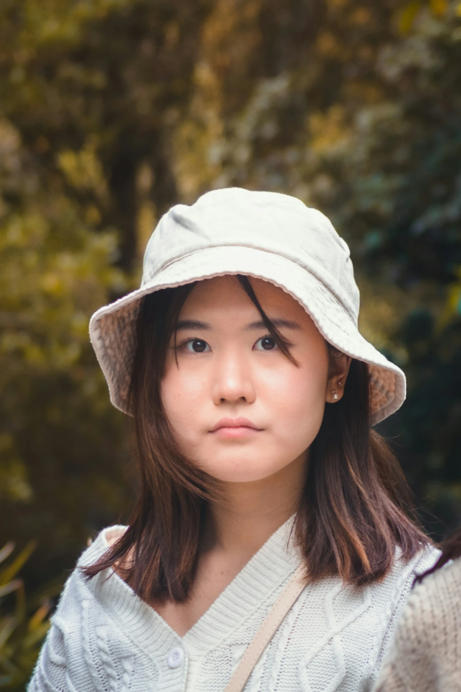 an image of a woman in a white hat