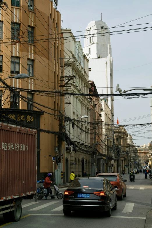 a busy street with many traffic and people