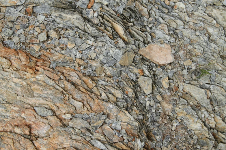 an old surface made of rocks in various shades