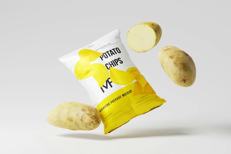 a potato on a white surface with a bag of potato chips