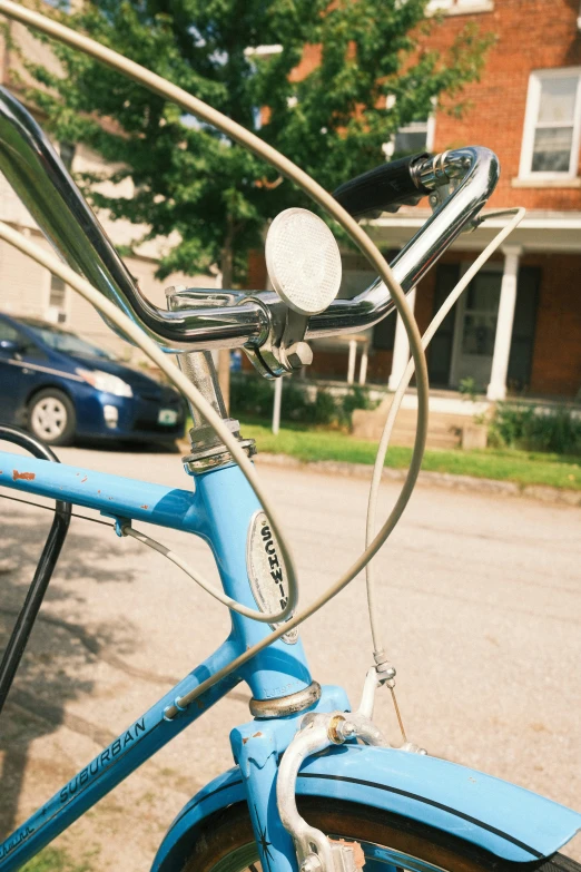 an up close look at the front handlebar and the rear tire