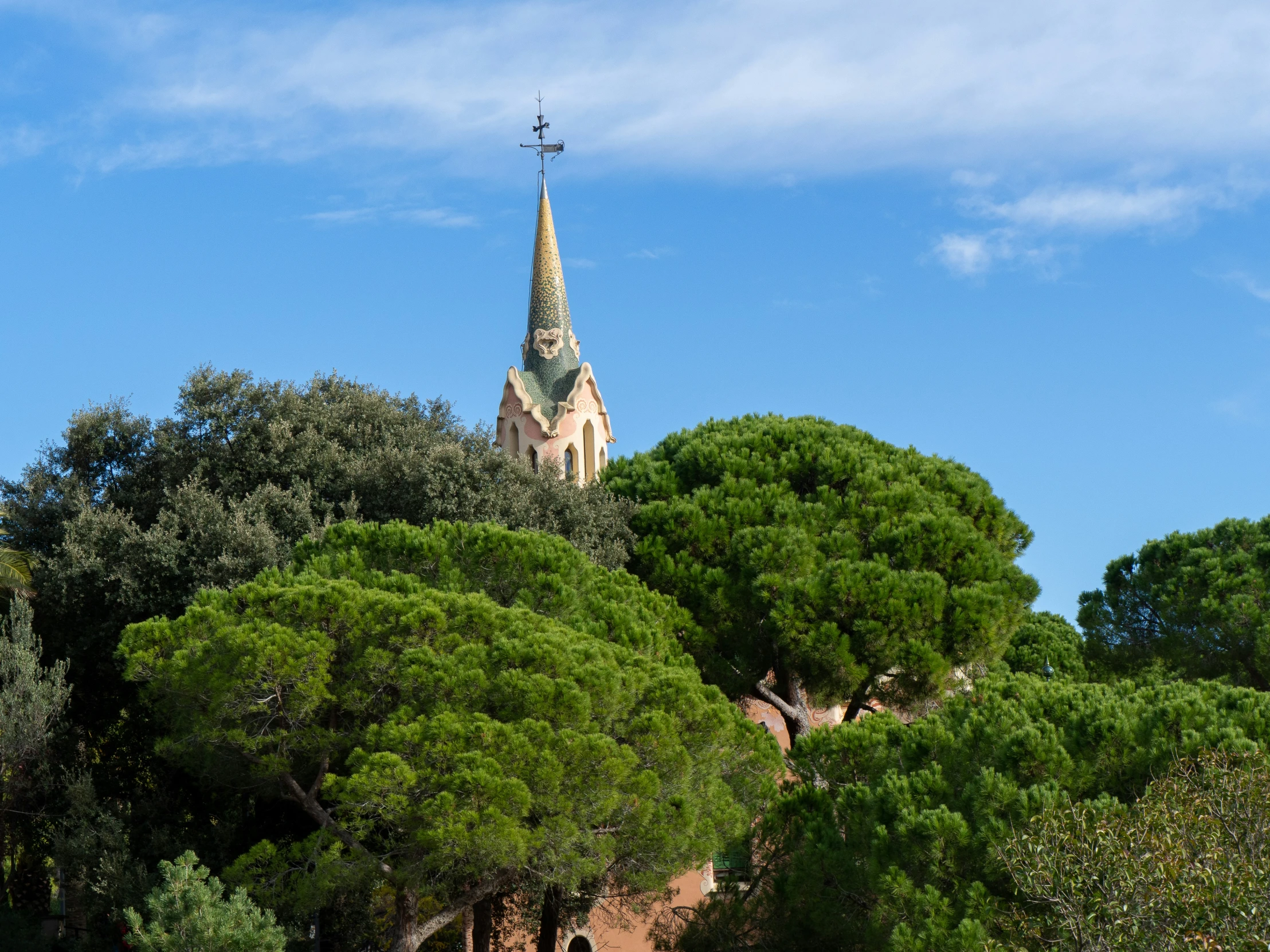 the tower of the church appears to have an unusually shaped spire