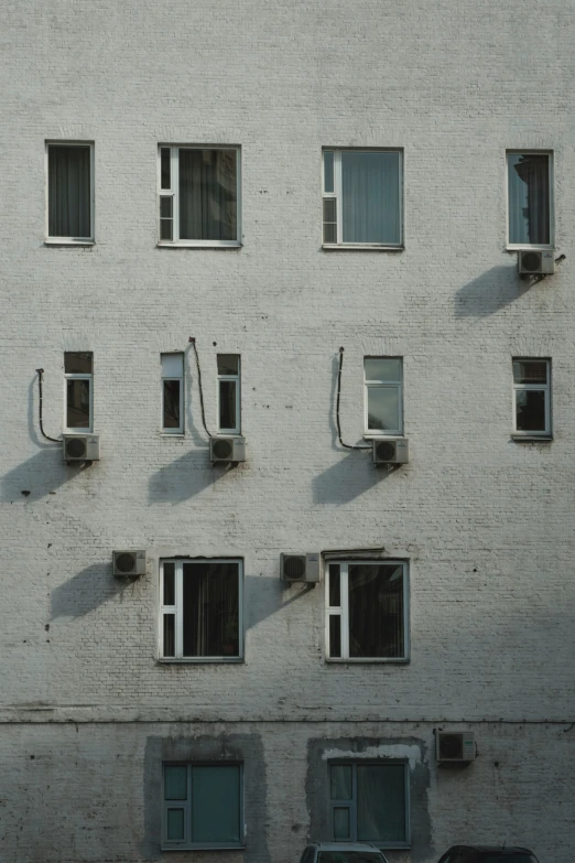 multiple windows, some with a wire running up one of them