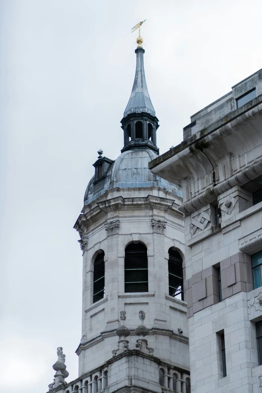 an old church building that has a clock on top