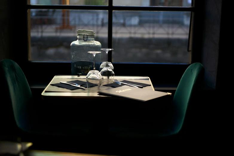 bottles are lined up on the table to drink