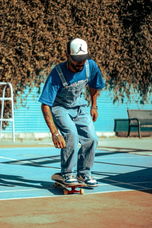 the young man is learning how to skateboard