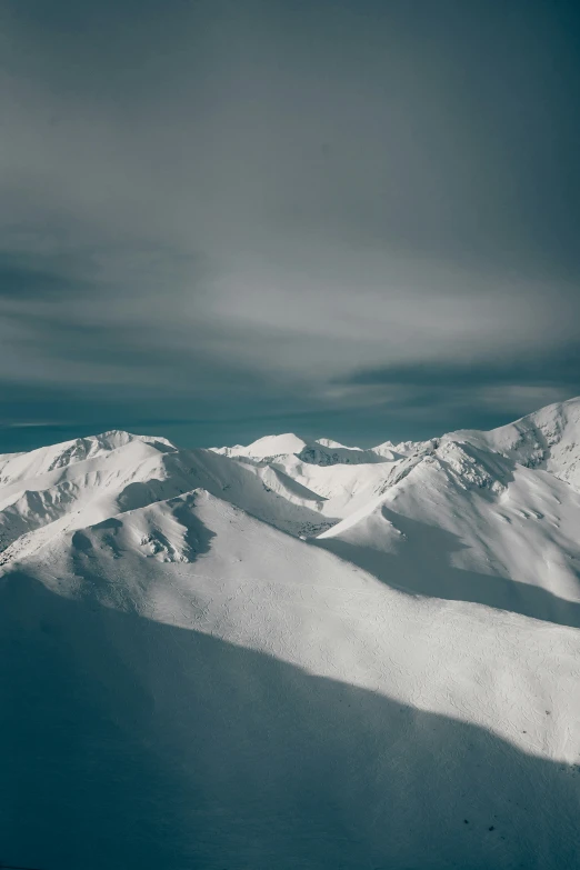 there are two people skiing on the slopes