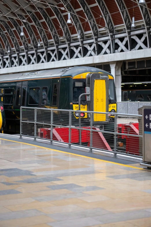 a train is pulling up to the train station