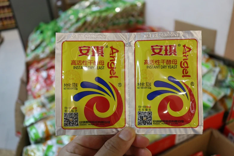 two packets of noodles are held in a box