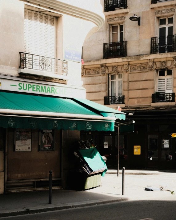 an umbrella store sitting on the side of a building