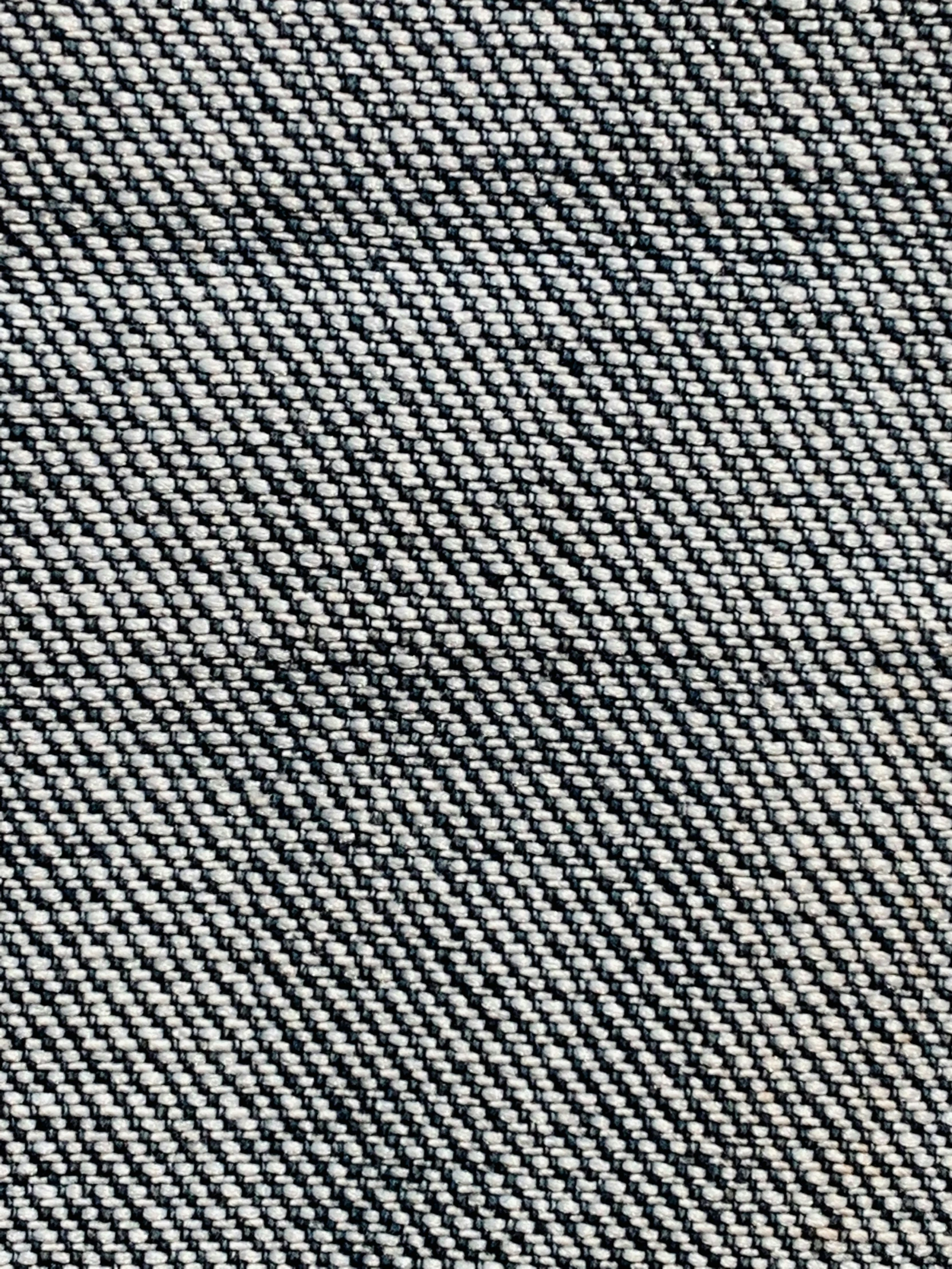 an up close image of a blue fabric