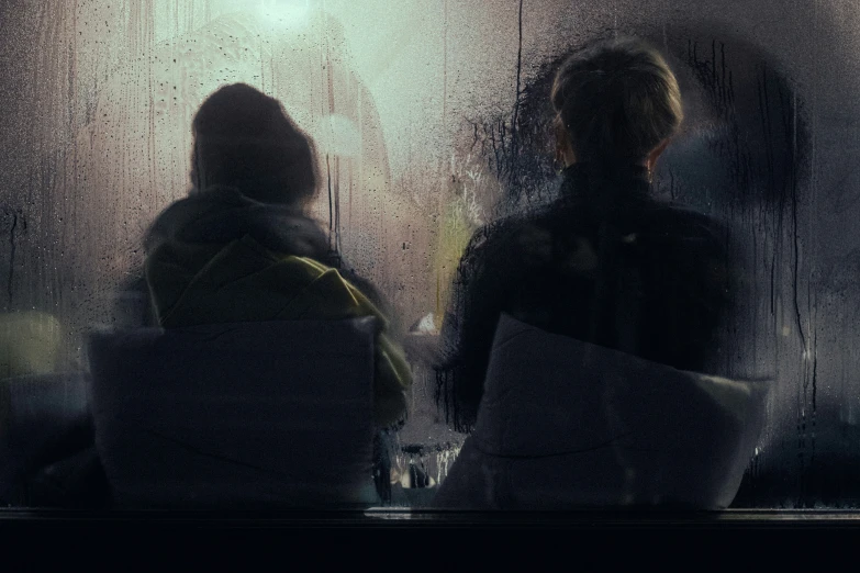 the reflection of two women in a glass wall