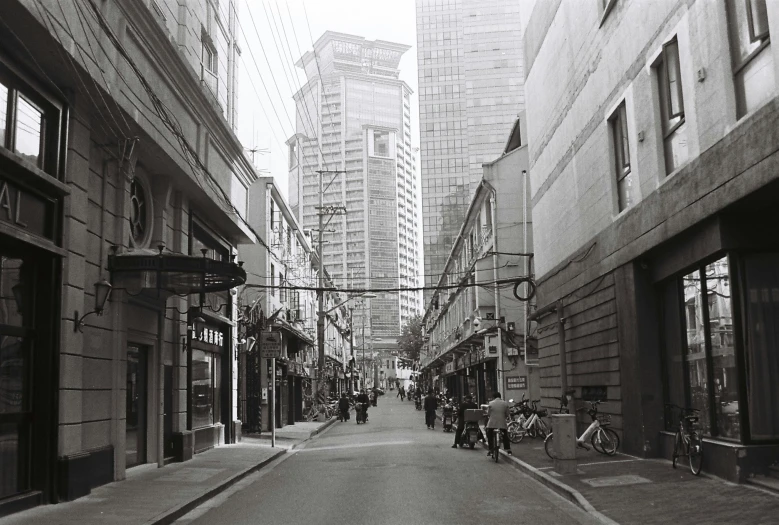 a vintage po of a street in the city with buildings