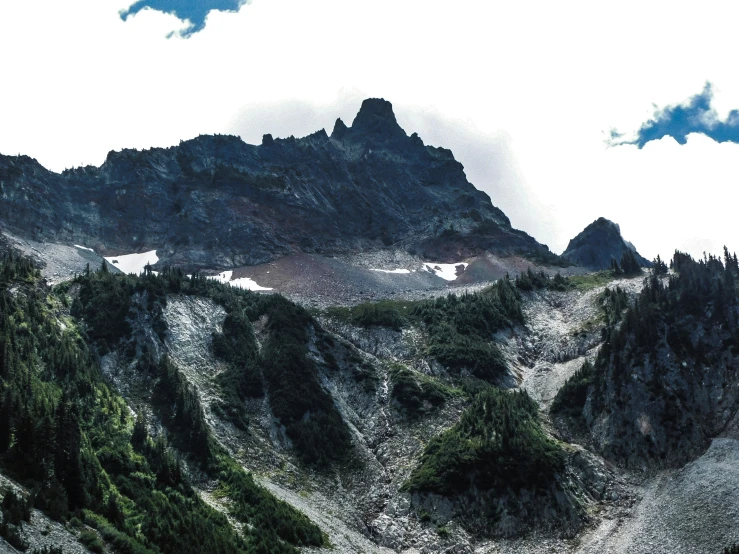 the tops of mountains in a rocky landscape