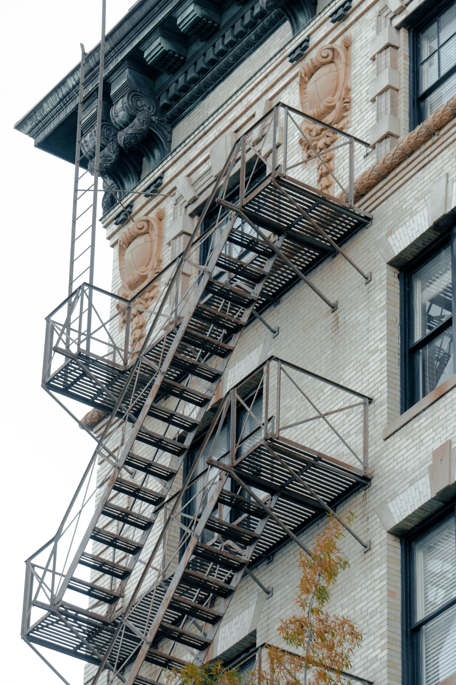 the outside view of an old building, with stairs to climb up