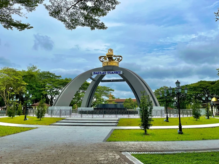 the entrance of an open space on a cloudy day