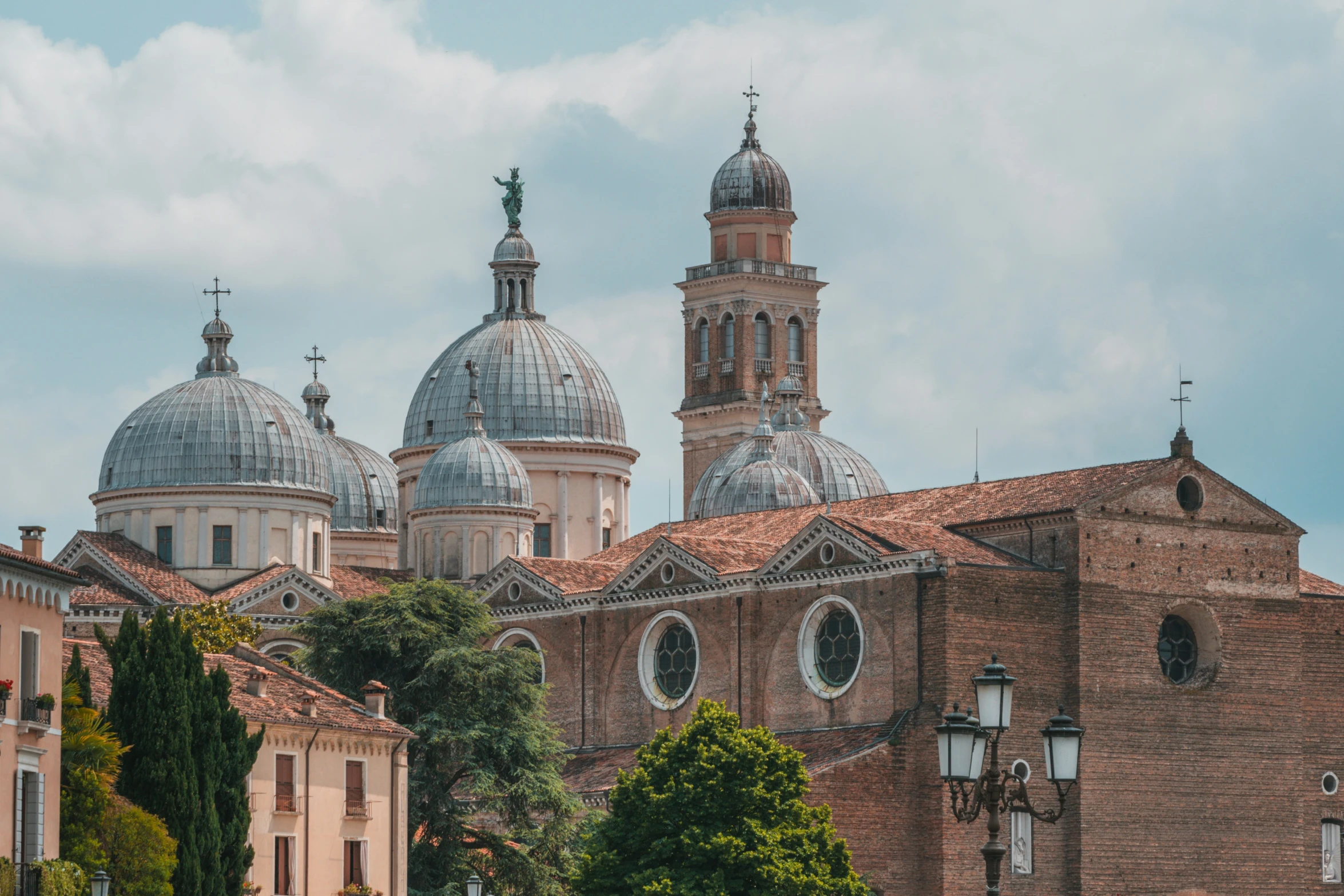 the tops of several buildings that look like they have domes