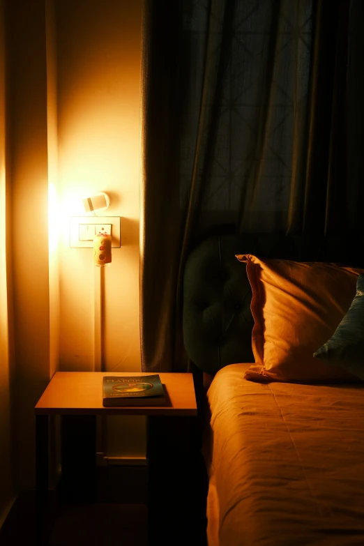 a dimly lit bedroom with one side covered in bed sheets