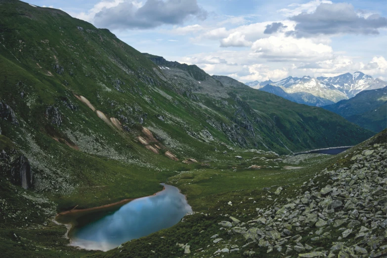 a large body of water in the middle of a mountain