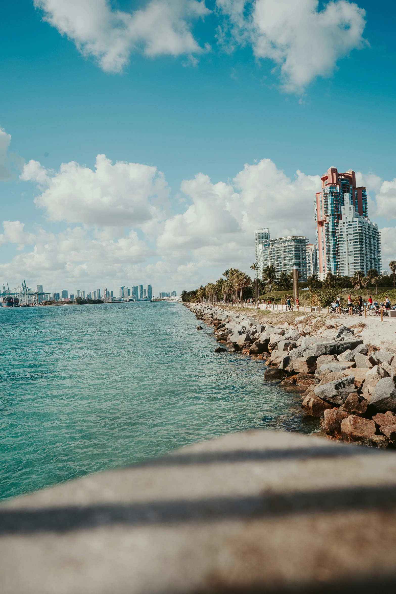 the ocean near the city as seen from an embankment