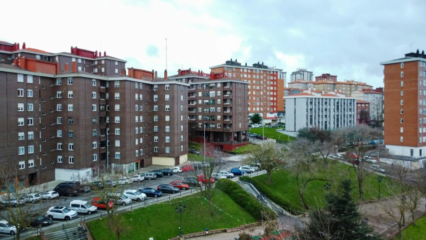 a group of apartment buildings on a city street