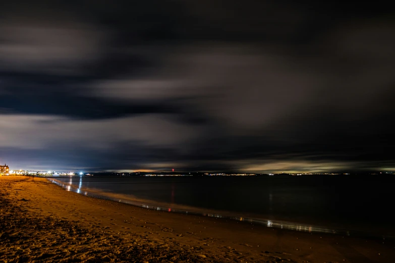 the sky over the ocean is very dark