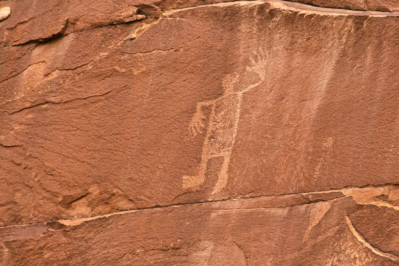 a large piece of brown rock with many layers