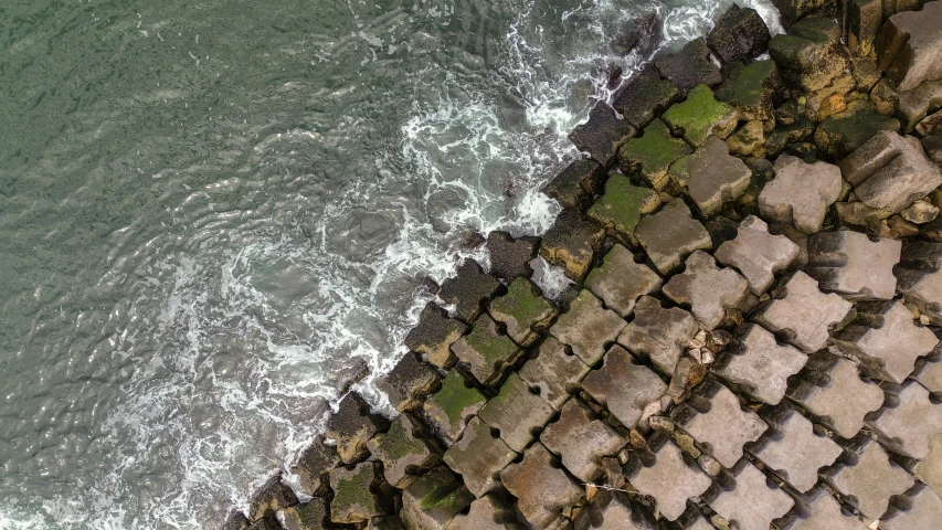 this is an aerial po of the shoreline with waves