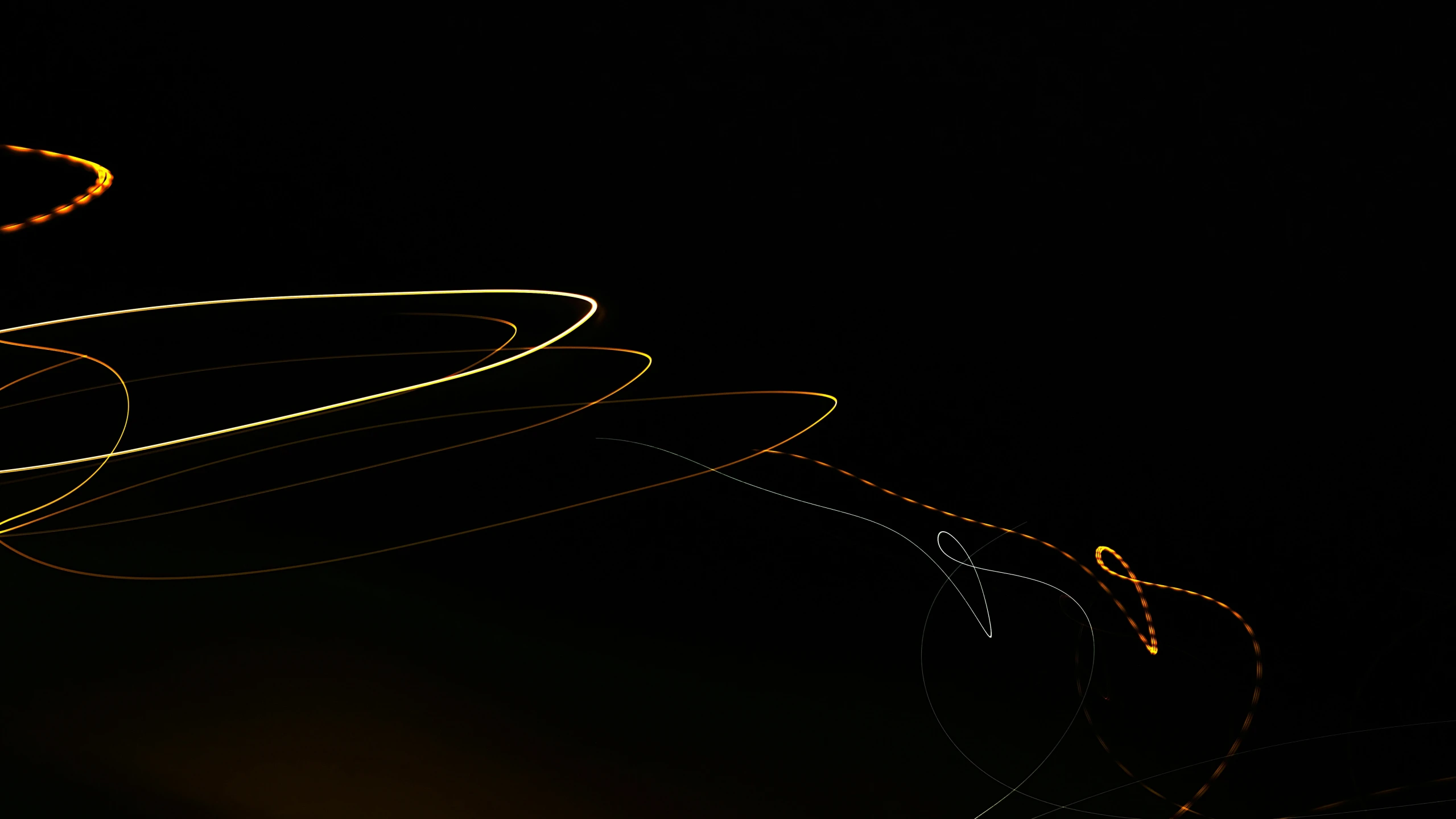 an image of curved lines being taken at night