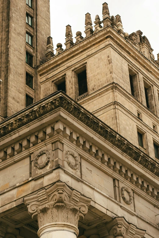 some architectural details on the top of an old building