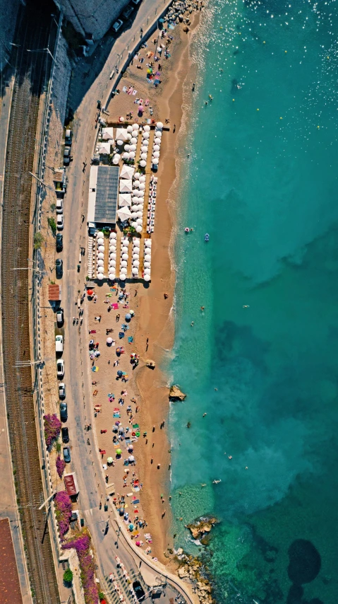 people enjoying the sunny day on a beach in europe