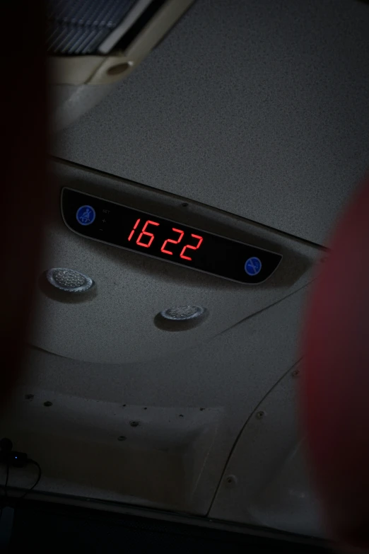 the electronic clock on the front of the bus