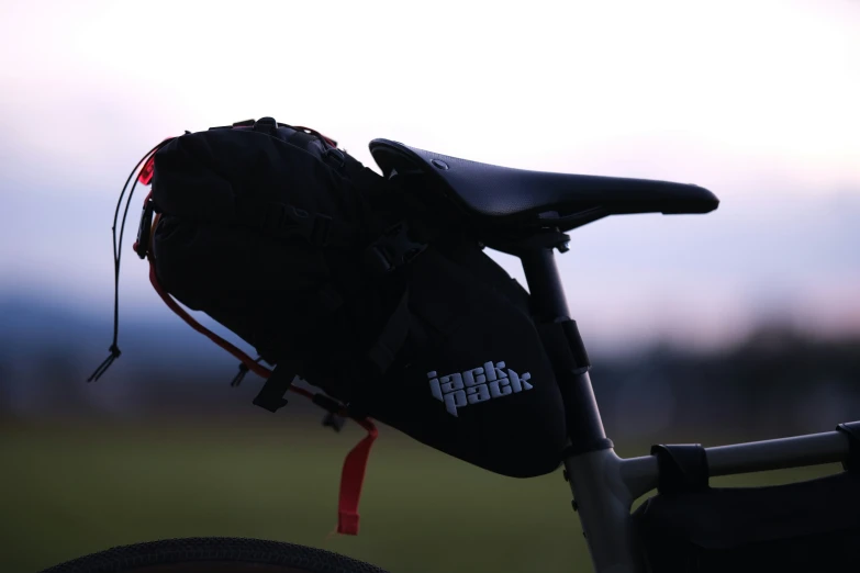 a bike that has a backpack attached to it