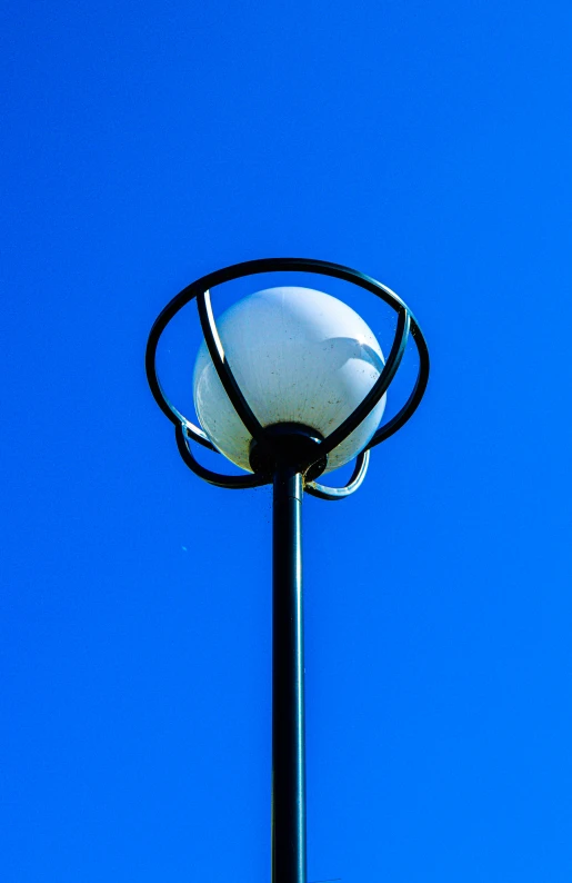 a close up of a light that is glowing in the sky