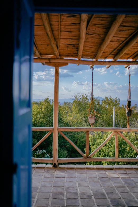 the porch overlooking the view from inside the room