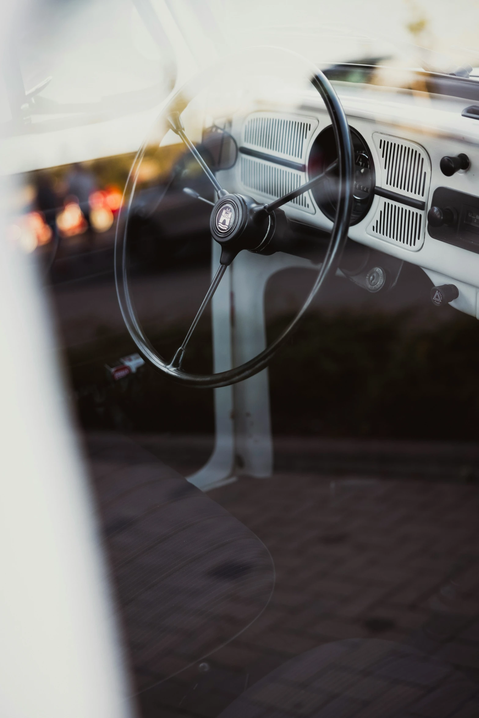 an old car steering wheel sitting in a vehicle