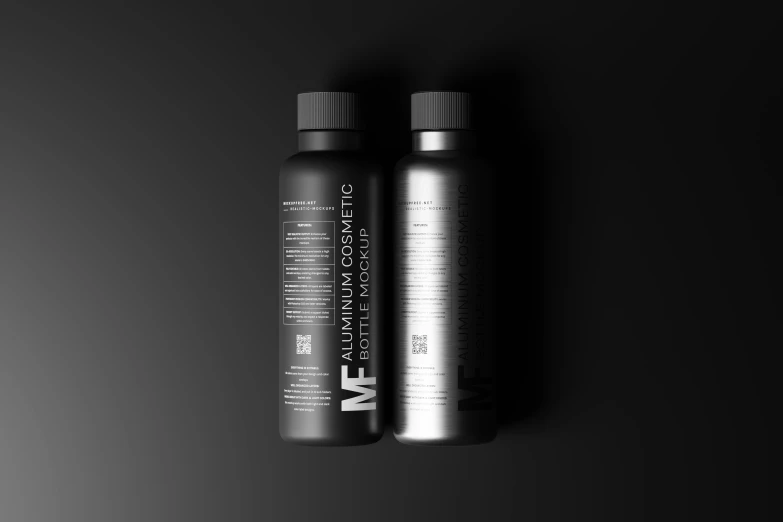 two gray bottle are placed beside one another
