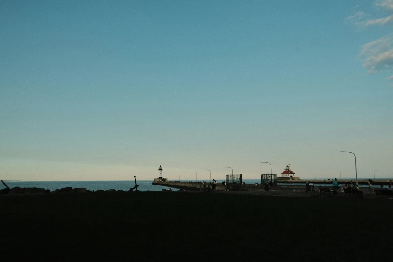 there are some boats sitting at the shore