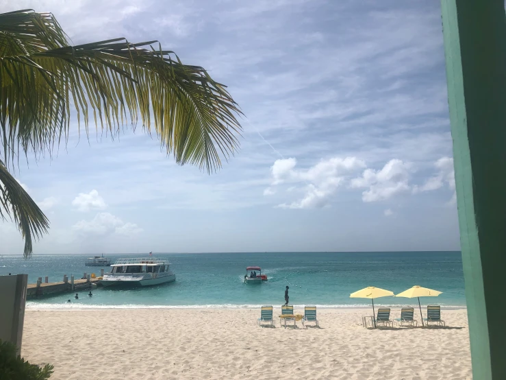 an empty beach that is filled with people