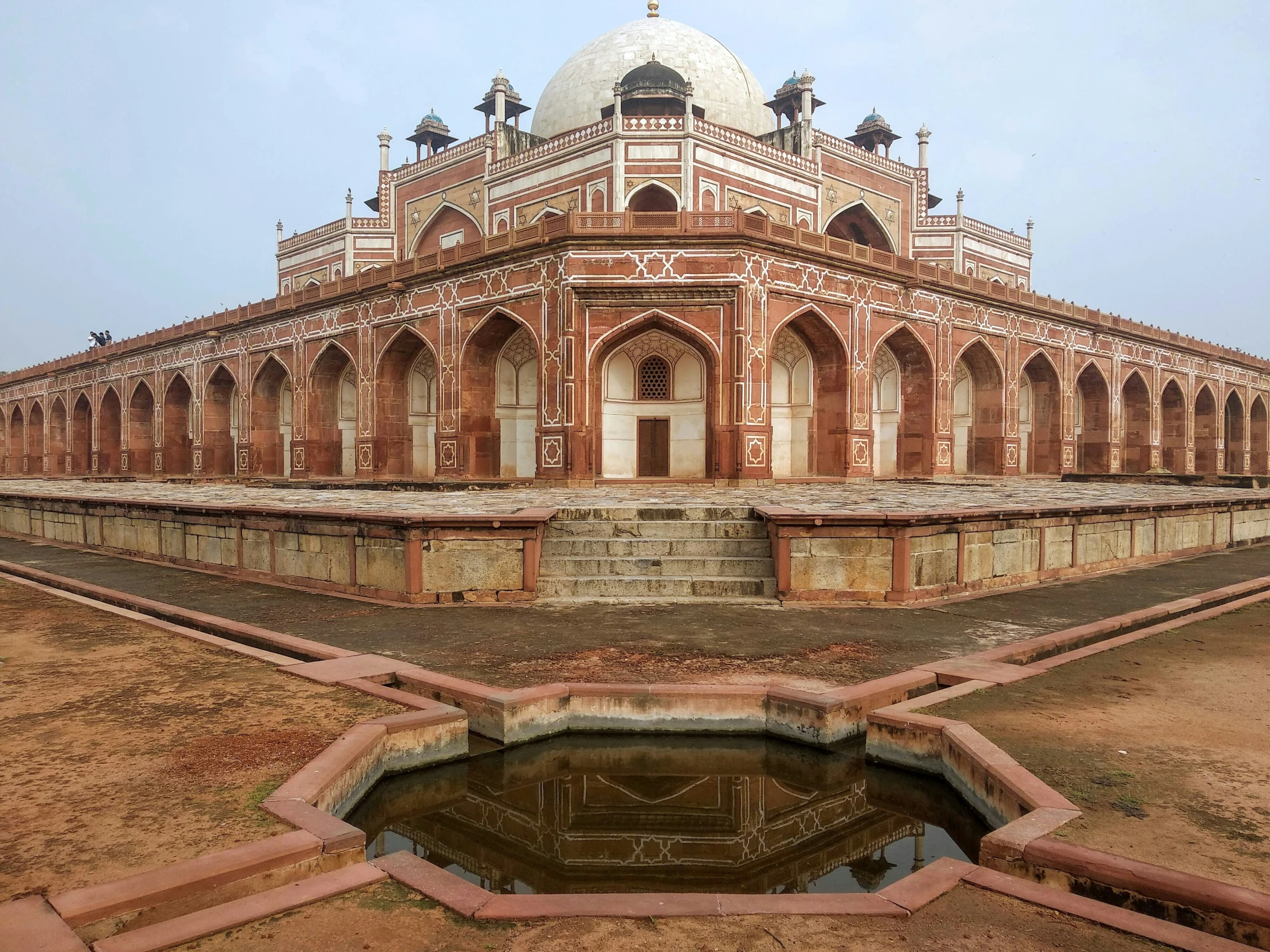 a large dome sitting on the side of a building