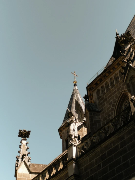 a church steeple against the blue sky