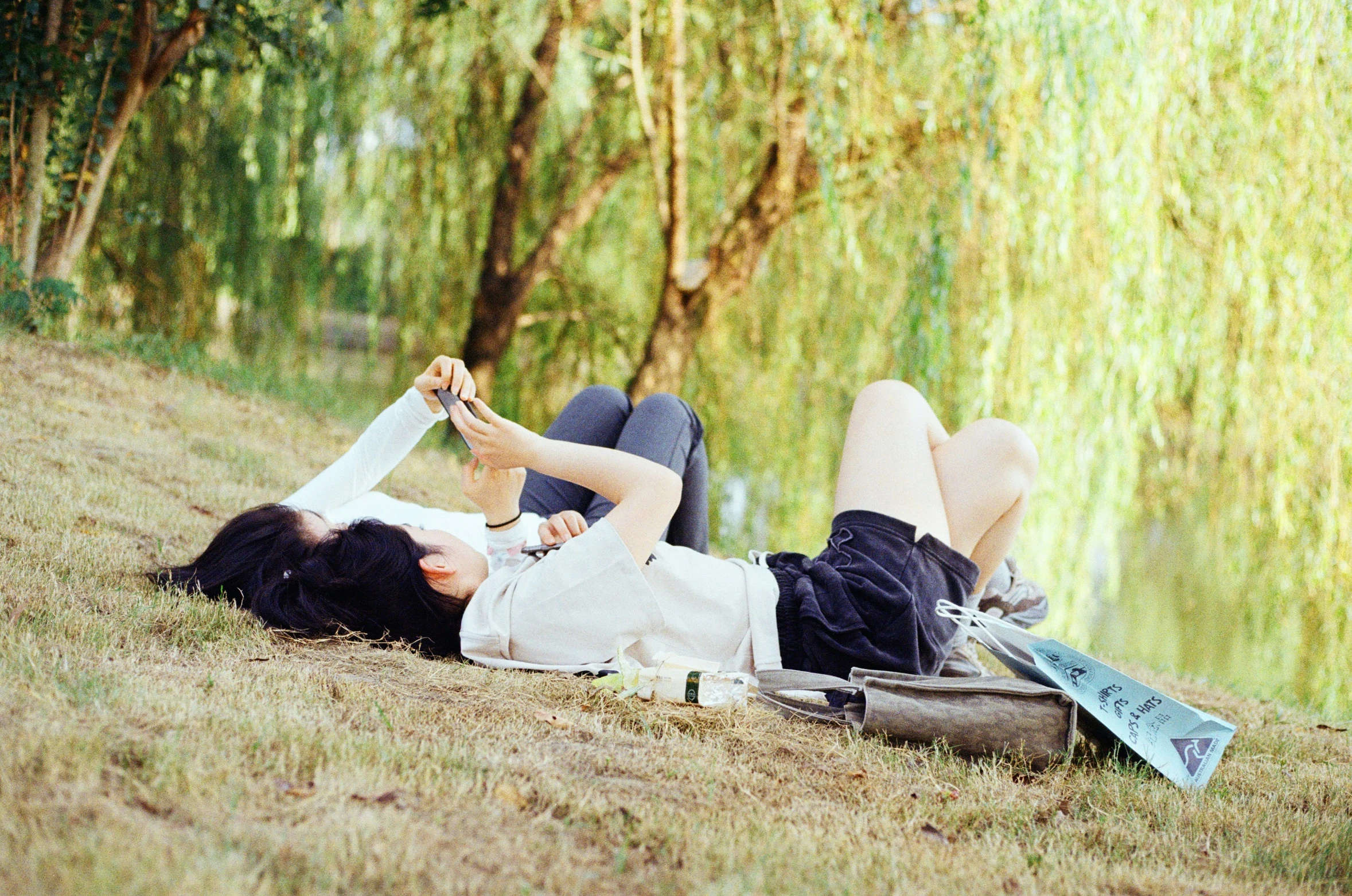 a man and a woman laying next to each other