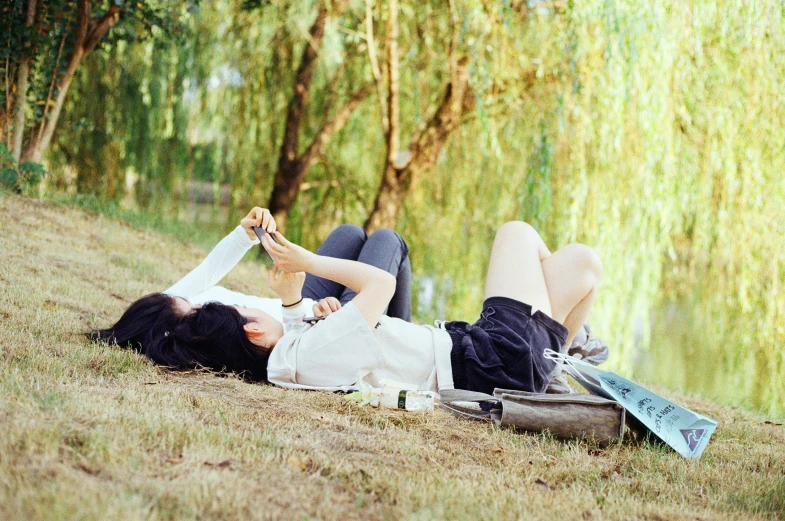 a man and a woman laying next to each other